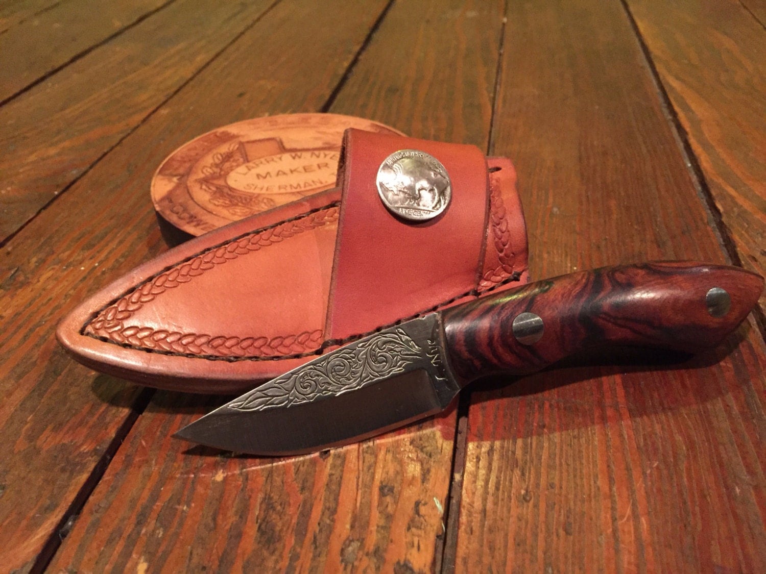 Handmade Texas hunting knife with hand stamped custom leather