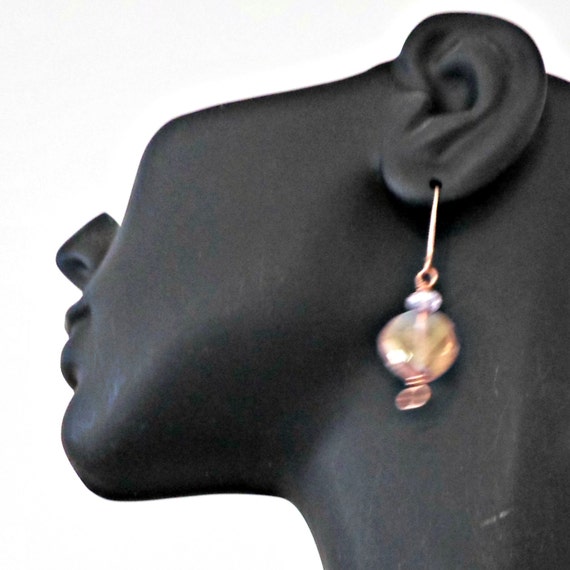 Items similar to Handmade earrings copper wire pierced pink transparent