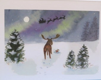 Set of 10 Christmas cards with moose, northern lights and santas sleigh.