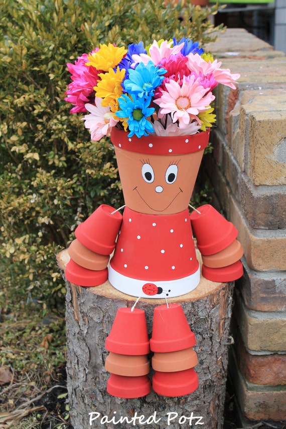 Items similar to Ladybug flower  pot  person clay  painted 