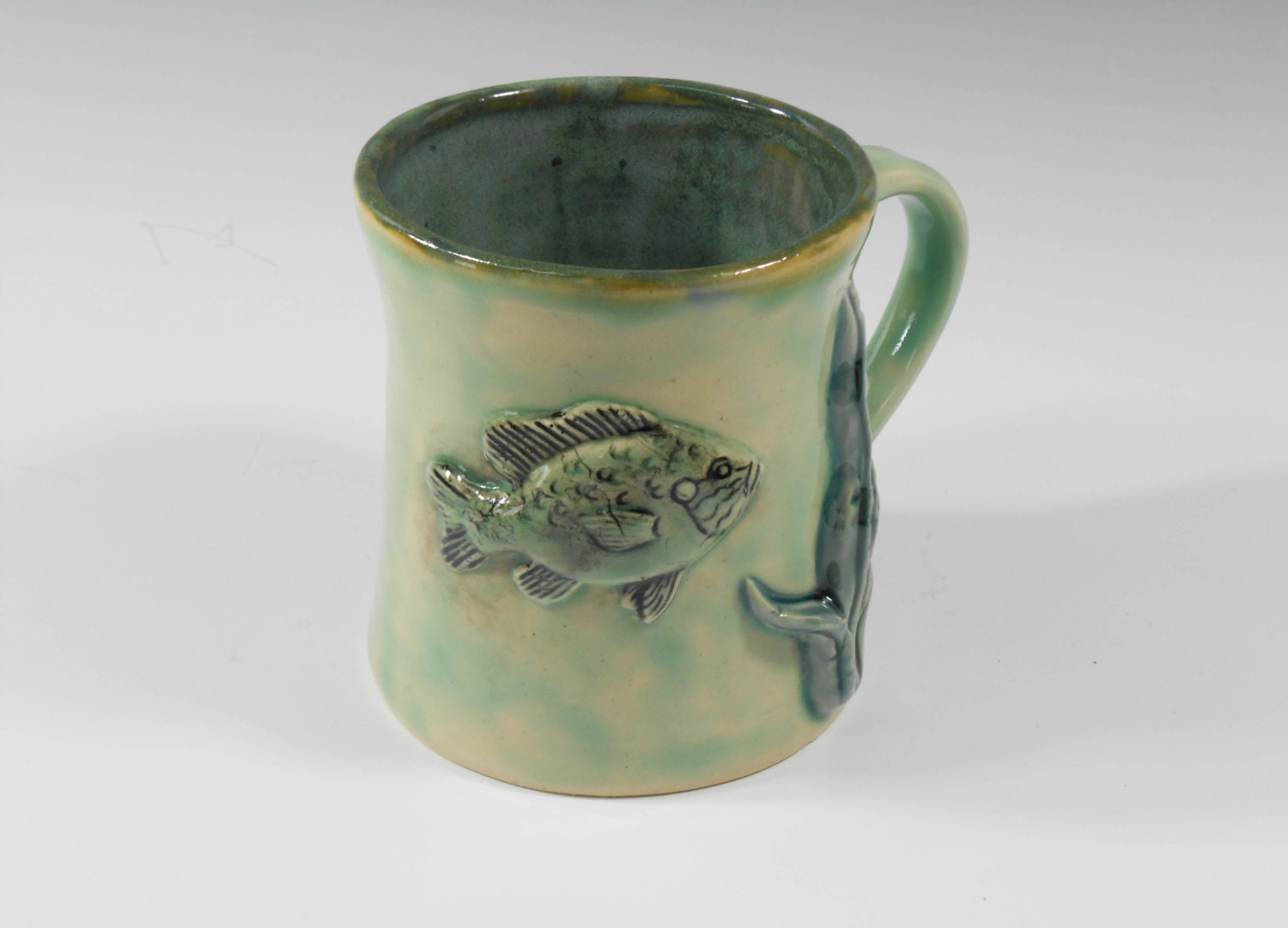 Handmade pottery fish mug with an underwater scene and crappie