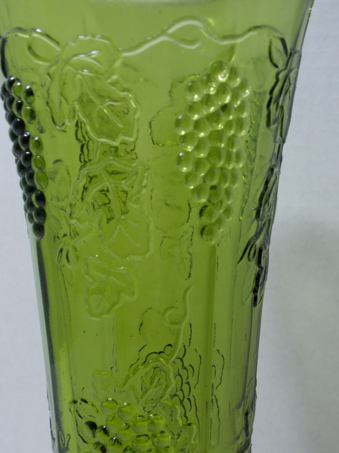 Green vase with bunches of grapes vines and by DocsOddsandEnds