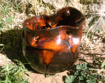 pottery vase glazed in metallic sparkly brown aventurine loosely thrown vase with holes