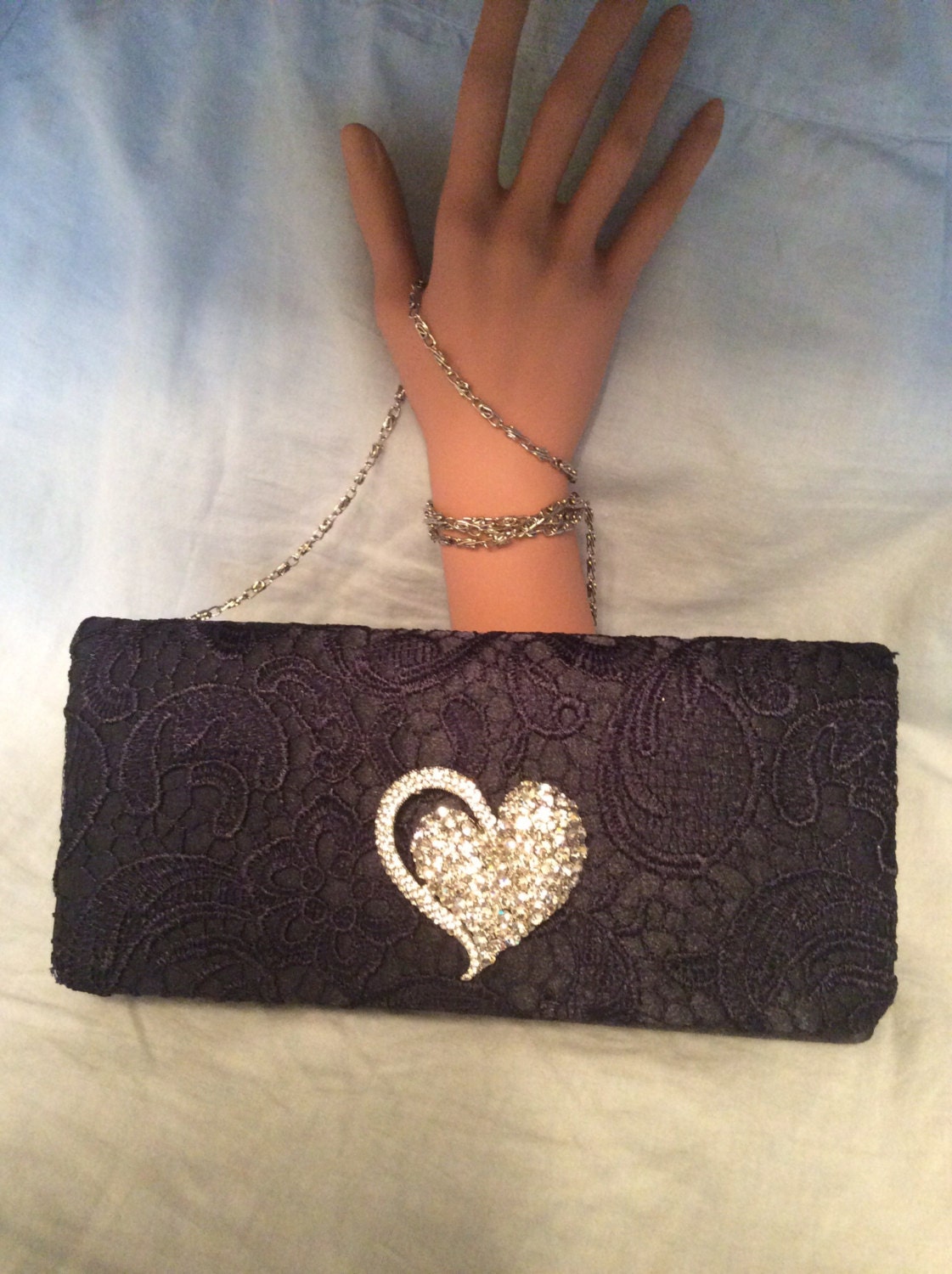 navy clutch bag with wrist strap