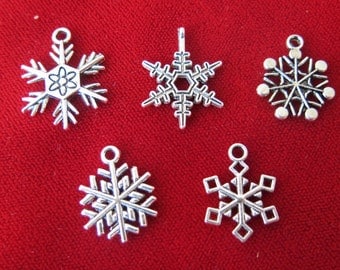 10pc "snowflake" charms in antique silver style (BC489)