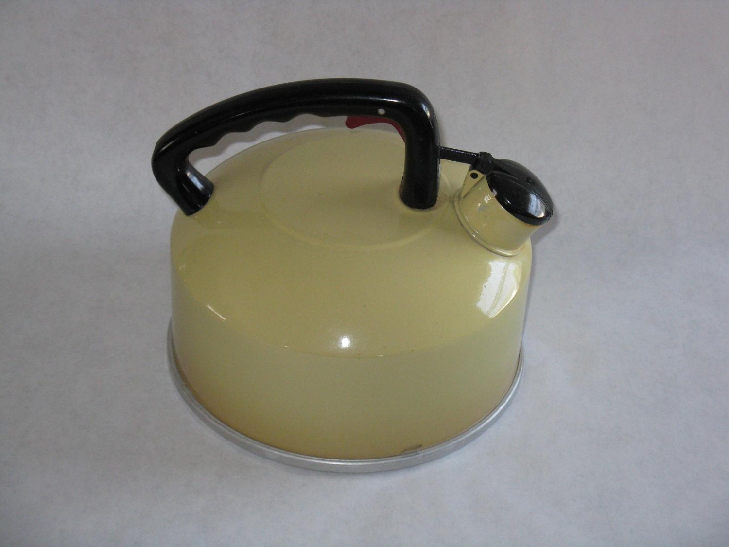 Vintage metal tea kettle whistling aluminum yellow harvest