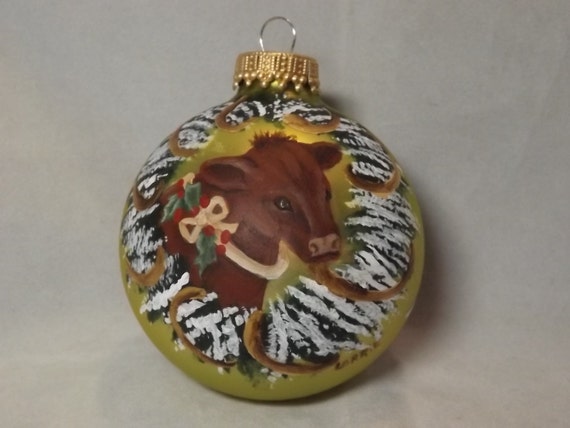devon cow christmas ornament hand painted on light green glass devon cow christmas ornament hand painted on light green glass