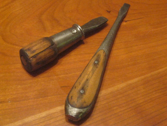 Small Hammer With Screwdrivers In Handle