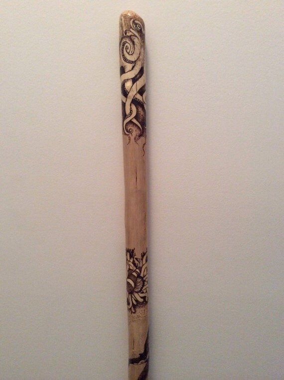 This 58 walking stick is full of marine life and by conecreation