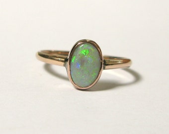 Items similar to Antique Opal, Garnet and Pearl Ring on Etsy