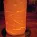 textured Ceramic translucent luminary or vase.