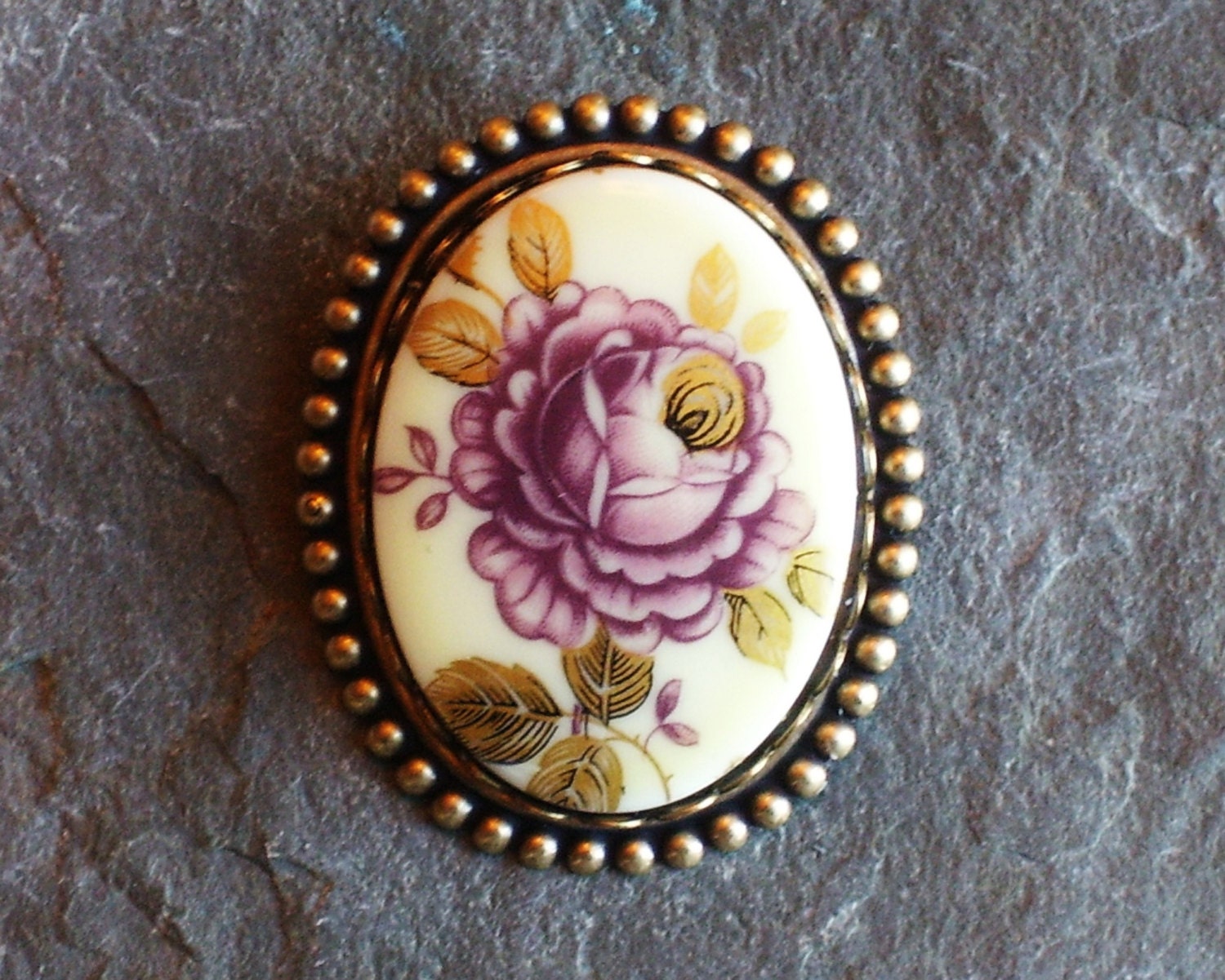 purple cameo brooch
