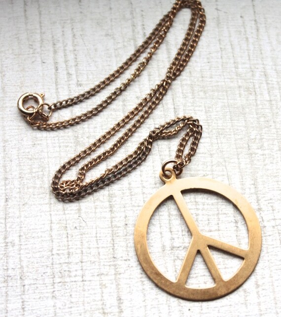 Items similar to 1960s Brass Peace Pendant Necklace // Hippie Woodstock