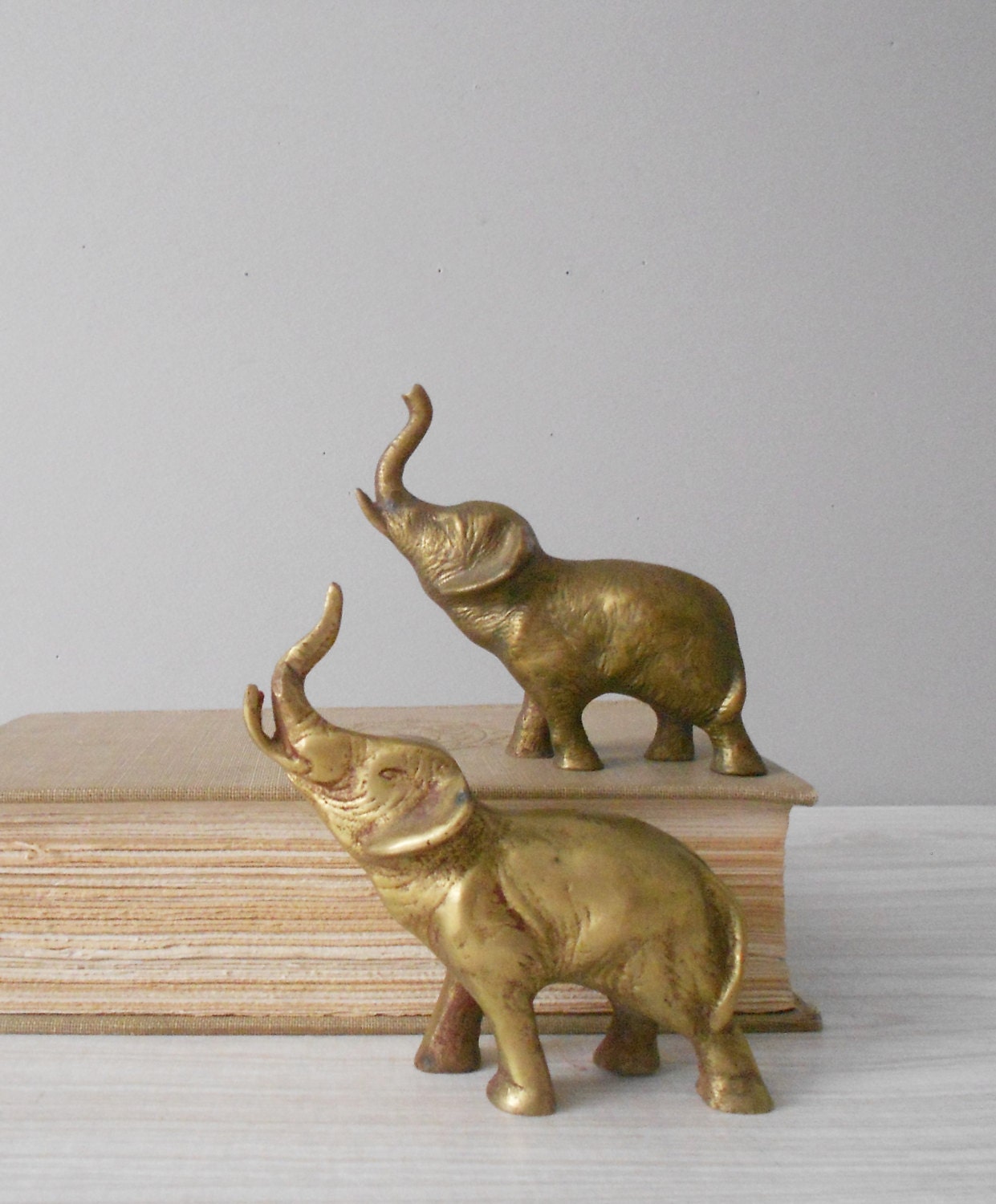 vintage solid brass elephant figurines // trunks up // set of