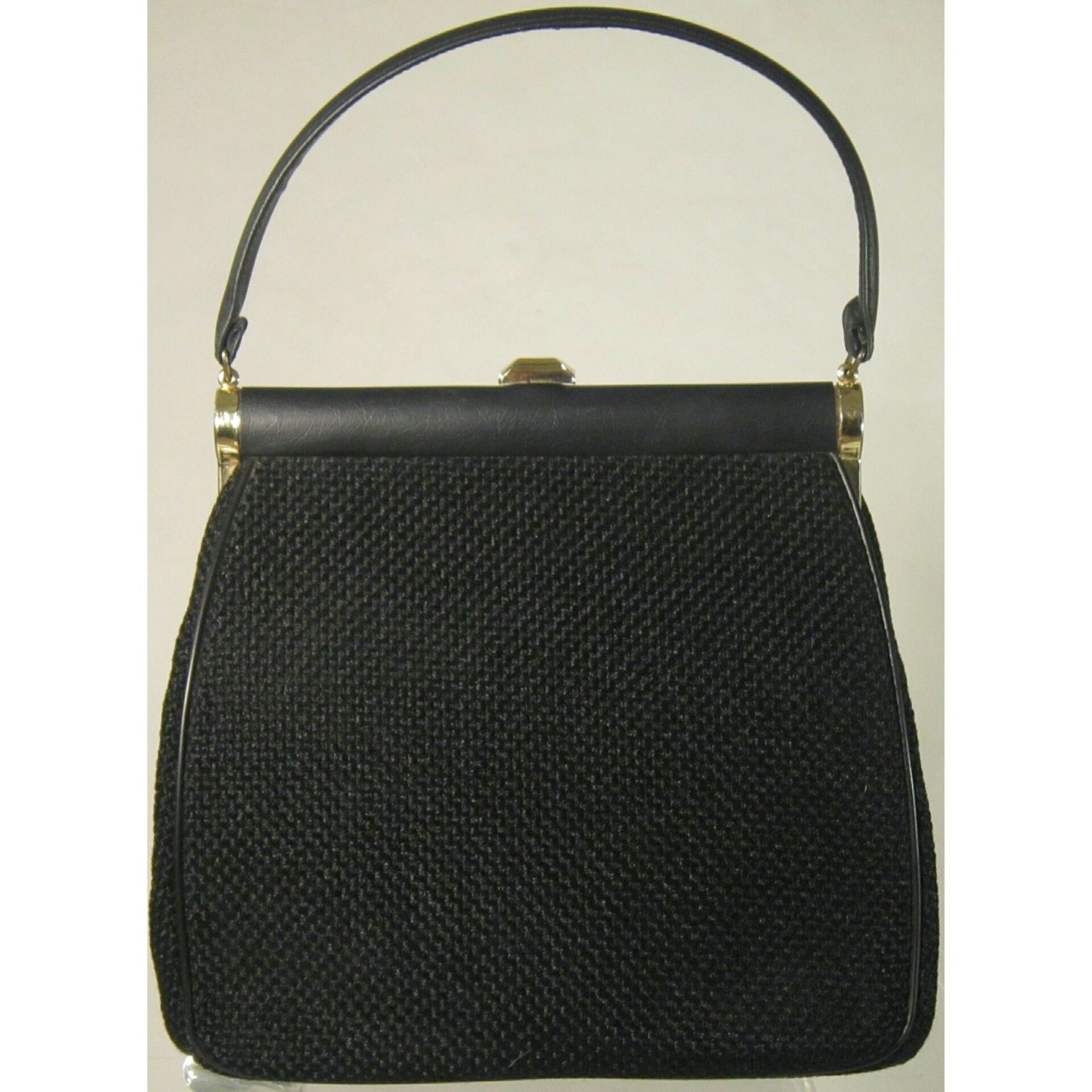 Vintage 1960's Black Bag with Red Lining. The Bag is Made