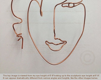 Metal wire wall art decor face sculpture. by TheoJHuckinsSculpts