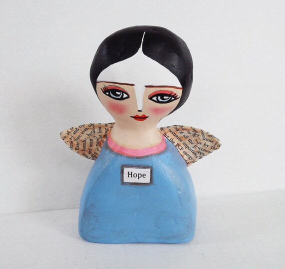 folk art angel figurine