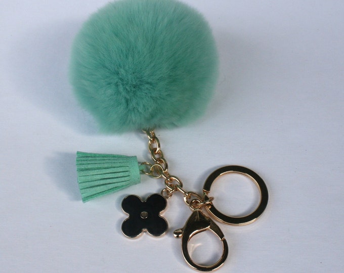 Candy Green fur pom pom ball with black flower keychain and green tassel Pom-Perfect™ collection