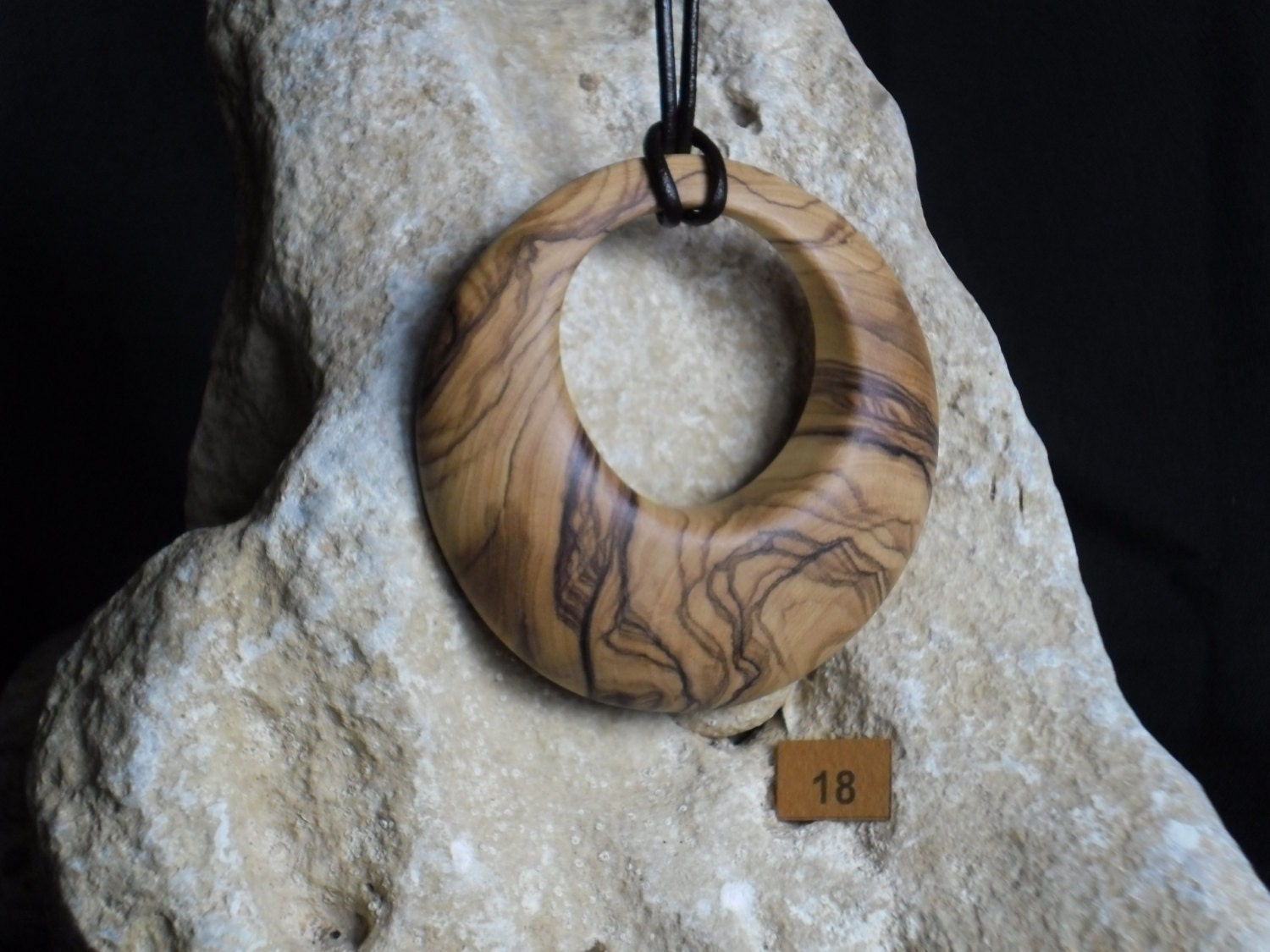 Hand carved olive wood necklace pendant