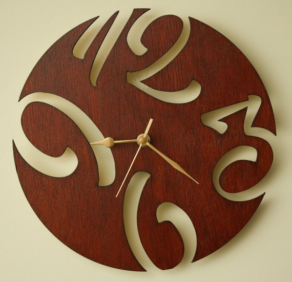 Laser cut wooden wall clock.