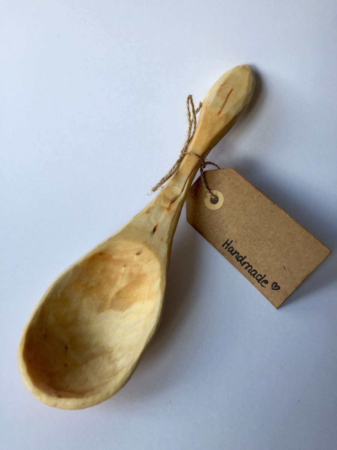 Large wooden serving spoon made out of birch wood cook ware