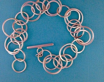 Multi -Ring Sterling Silver Bracelet