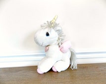 precious moments unicorn figurines