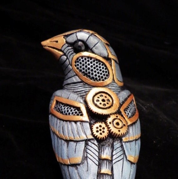 Clockwork Bird silver color sculpture by PurplecatCreatives