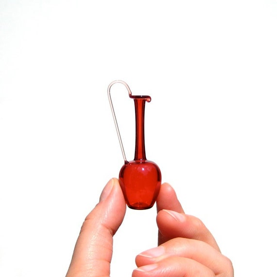 https://www.etsy.com/listing/232939601/miniature-pitcher-in-ruby-red-hand-blown?ref=shop_home_active_45