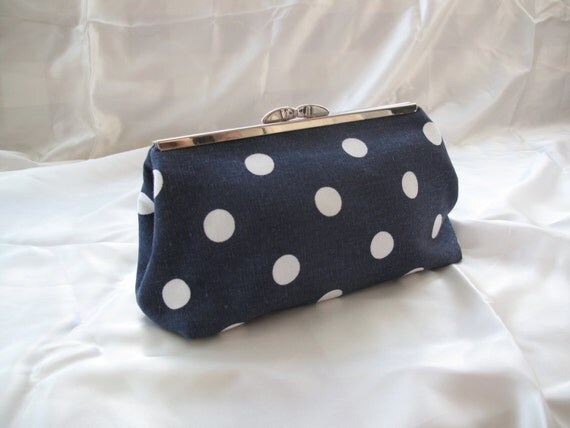 navy and white polka dot clutch bag