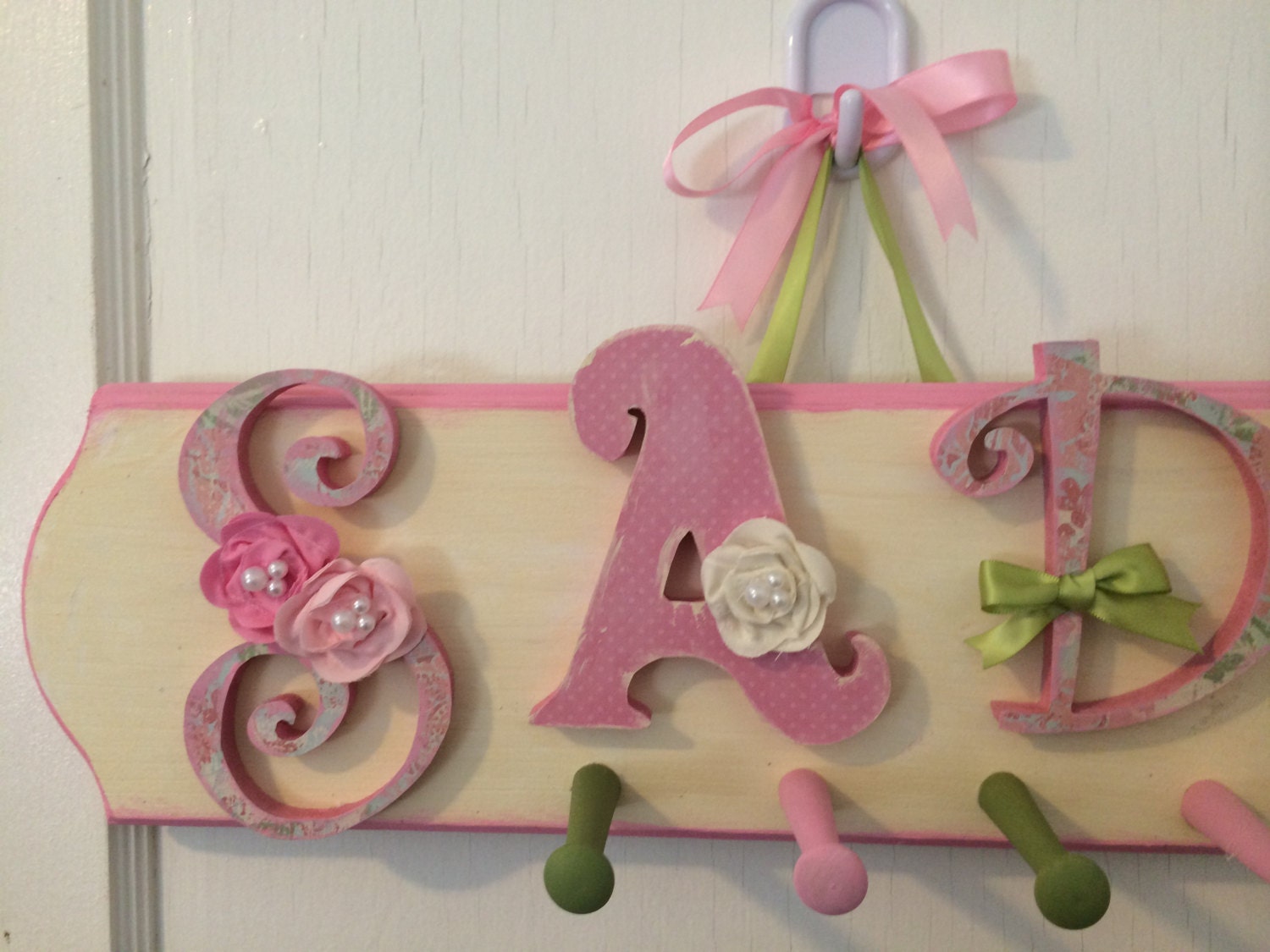 Custom Kids Name Sign Peg Rack Nursery Wall by pinkapotamus