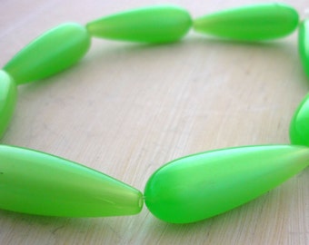 Vintage elongated teardrop spring green lucite moonglow beads 30mm x 10mm