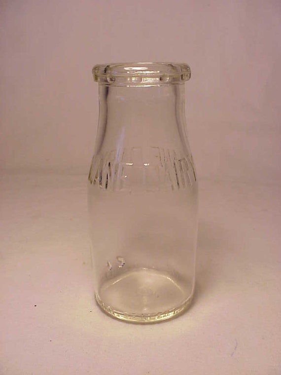 1956 Lane Dairy Embossed Half Pint Milk Bottle by Bottlessoldcheap