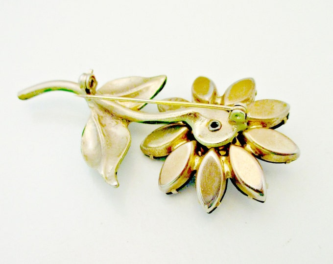 Flower Brooch with black and white glass and green enamel pin