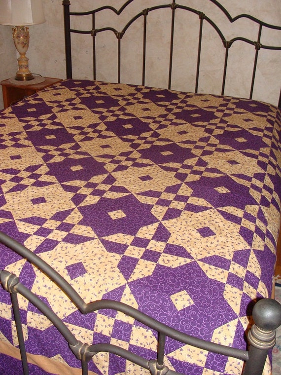 contrast in purple queen size quilt top and binding only