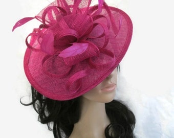 Pink Fascinator.Stunning Fuschia Pink Sinamay Shaped disc Fascinator with double swirls , loops..wedding,races
