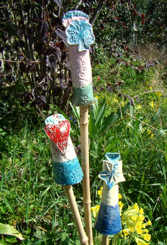 Ceramic toppers for garden bamboo cane sold in a set by noblebirds