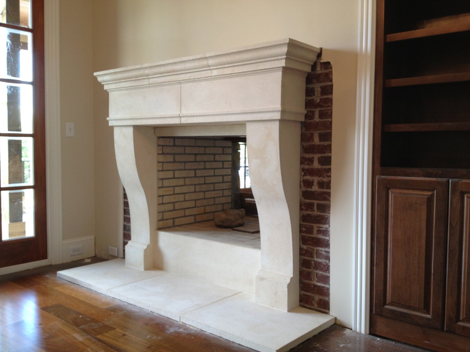 Limestone fireplace mantels