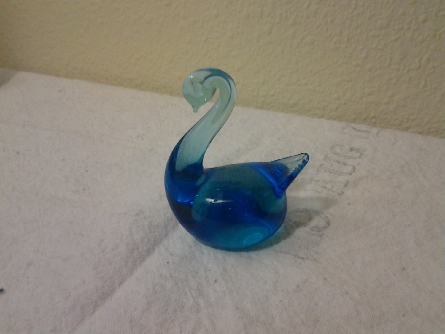 blue glass swan figurine