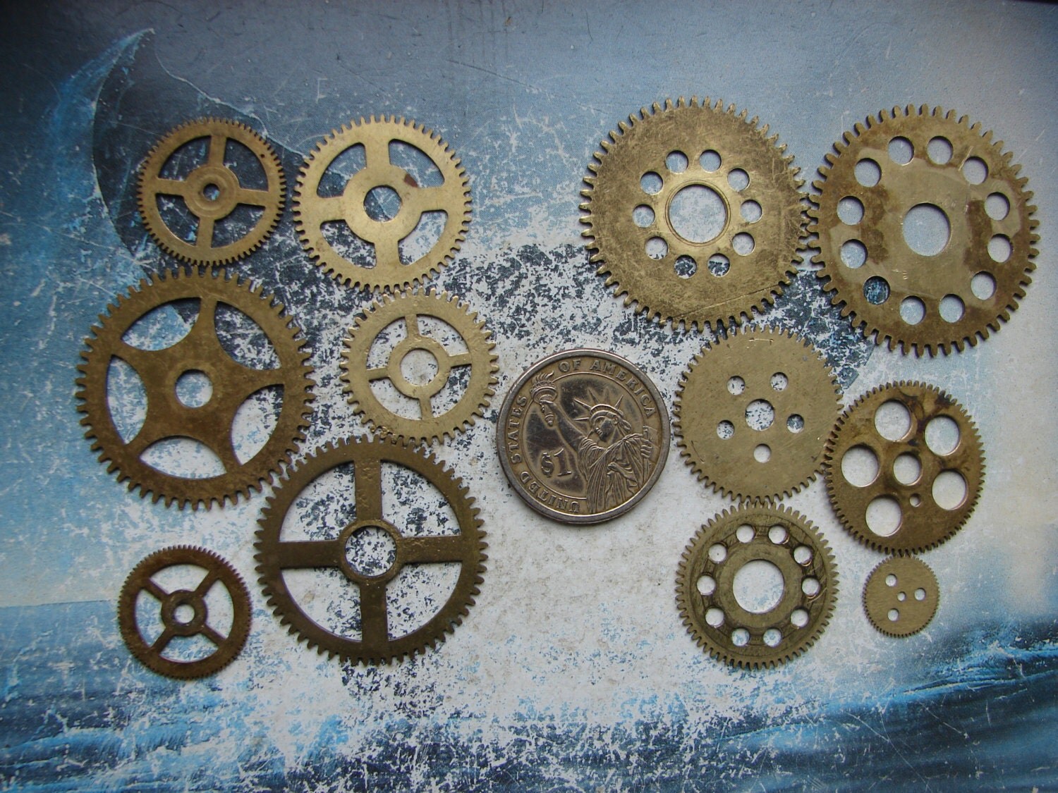 Set of 12 Vintage clock GEARS / small size brass by Tiktaktuk