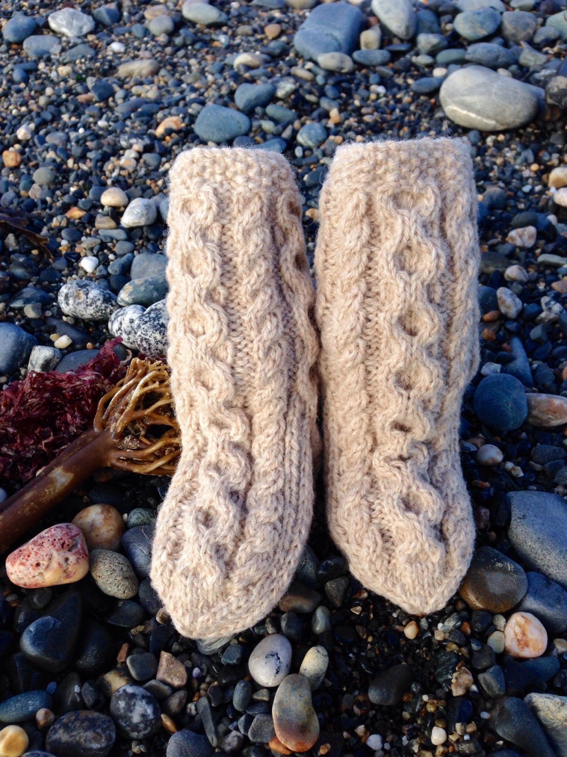 Luxurious hand knitted children's bed socks using locally