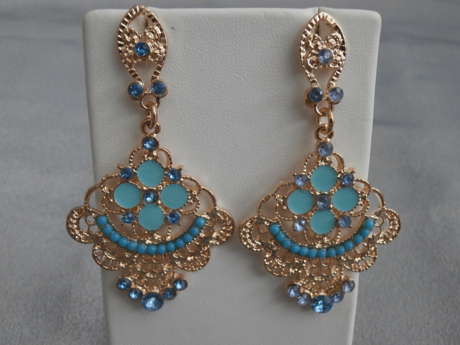 Beautiful Gold Chandelier Earrings with Light Blue Enamel and