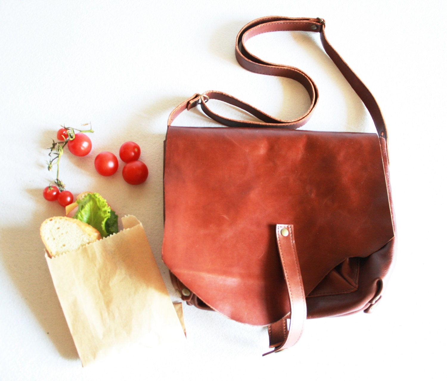 small brown leather messenger bag