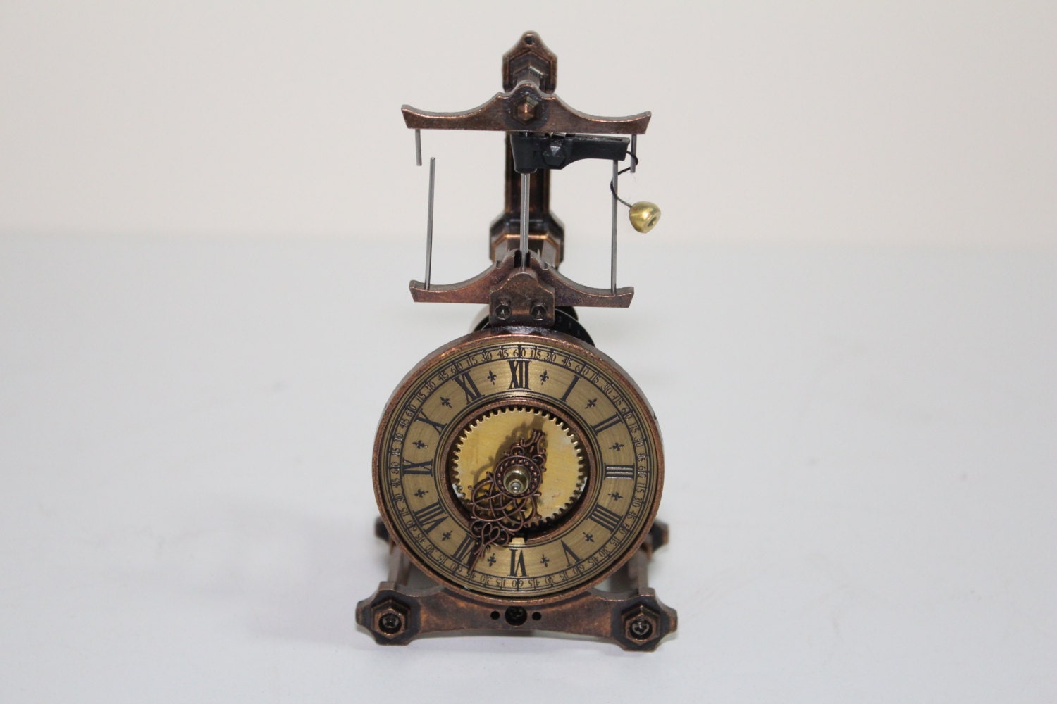 Guild Flying Pendulum Windup Diecast Brass Miniature Clock