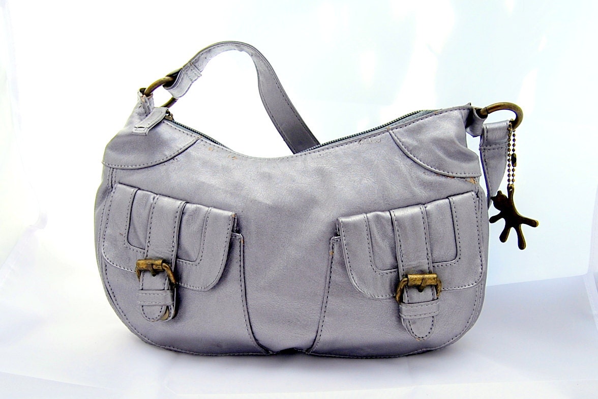 silver coloured leather bag for woman