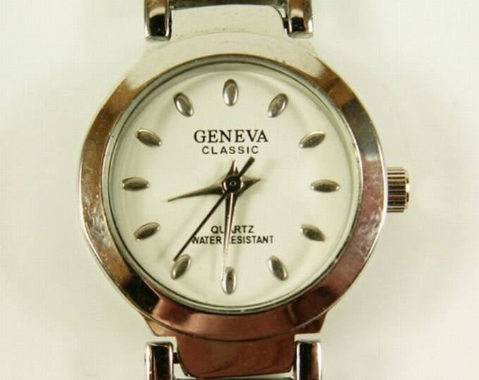 Storewide 25% Off SALE Lovely Vintage Geneva Classic silver tone quartz watch featuring a round white bezel with black markings