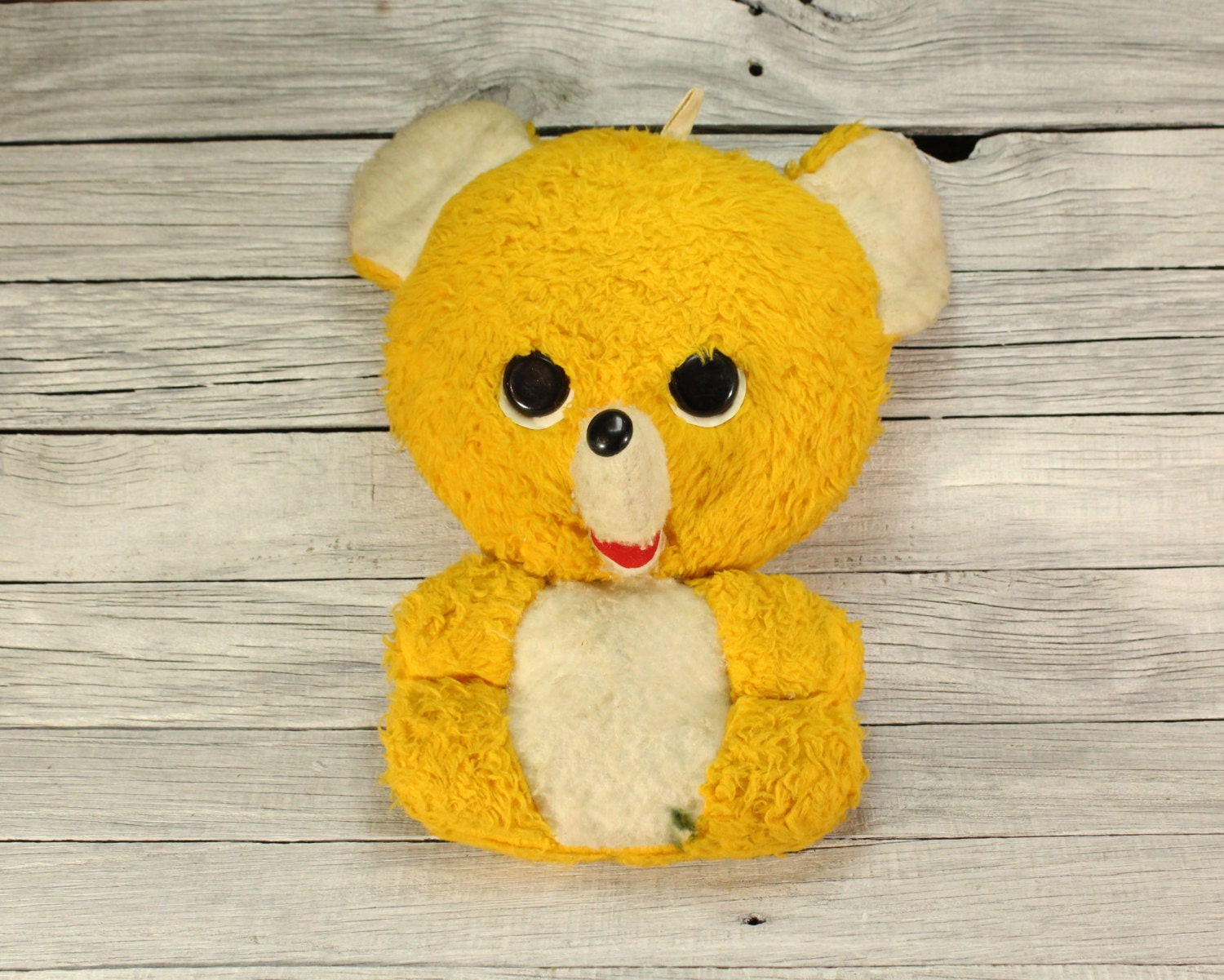 white and yellow teddy bear