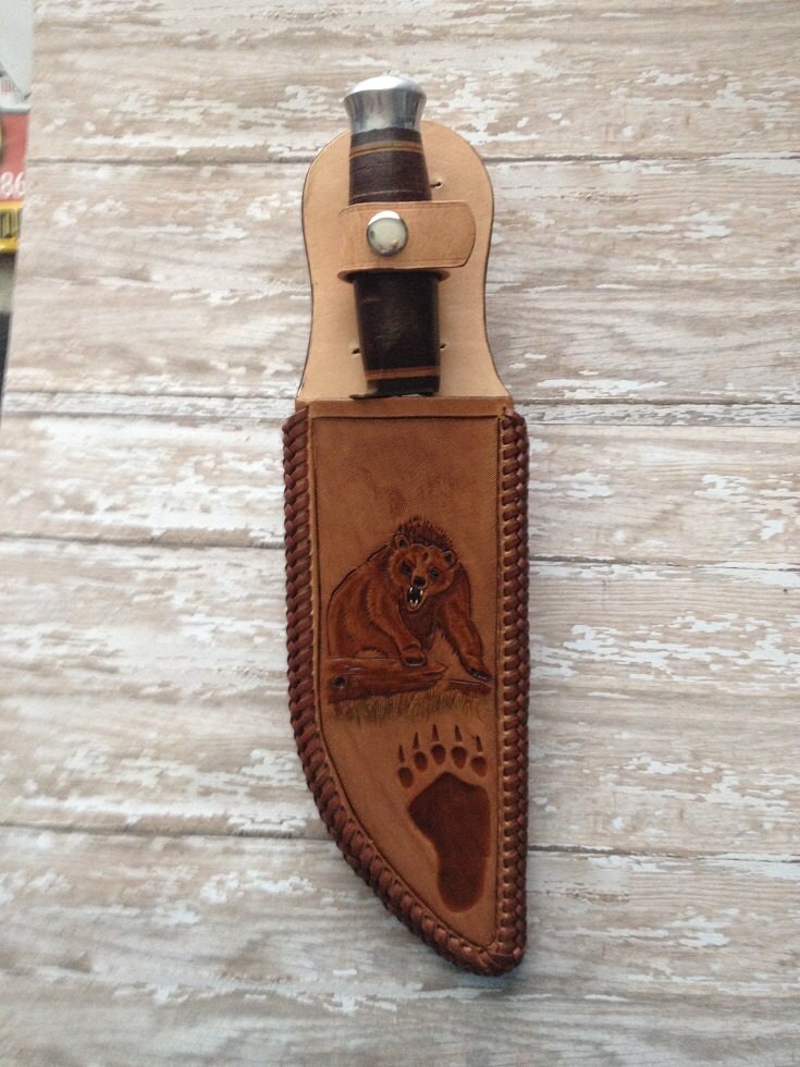 Hand tooled leather knife sheath with Grizzly Bear