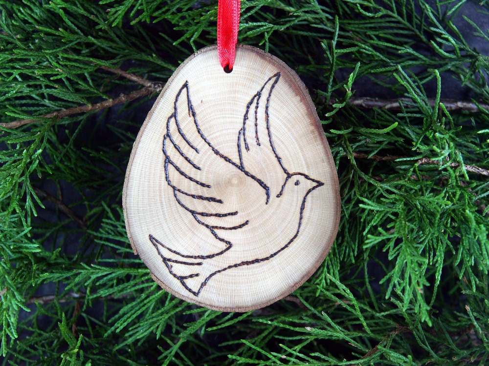 Dove design handmade wooden ornament.