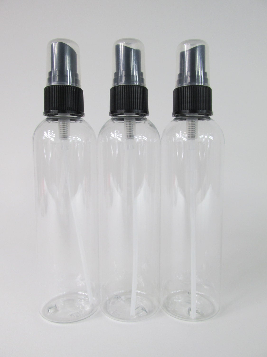 4 oz. Clear Boston Round Plastic Spray Bottles by Warehouse1711